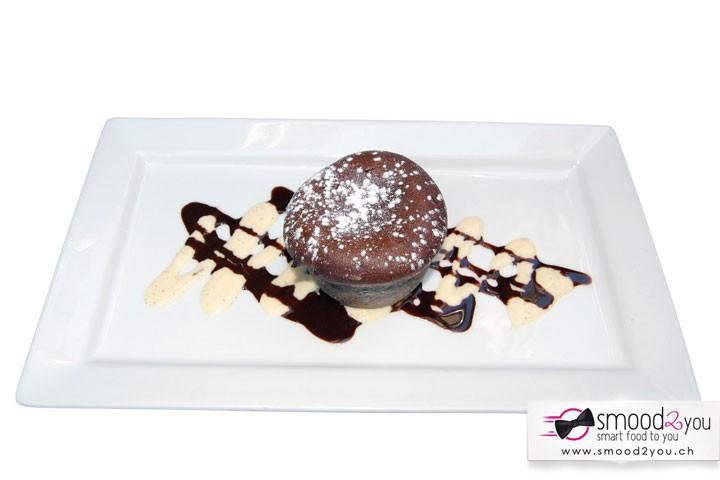 Warm Swiss chocolate cake served - Café du Centre