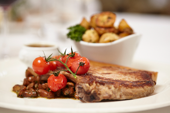 Locally Framed Pork Chop - Café du Centre
