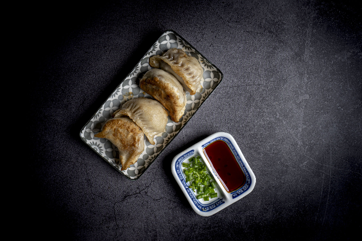 B8. Ravioli Stuffed with Grilled Chinese Pork (Guo Tie) - La Baguette d'Or