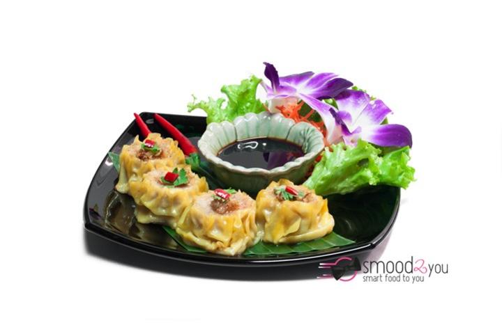 Steamed shrimps and pork raviolis - Green Mango