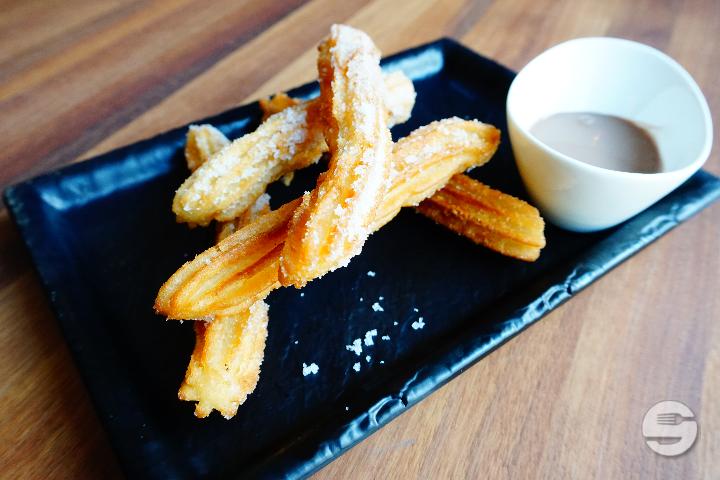 Churros with Chocolate Sauce - Volver - Café Tapas Vinos Luzern