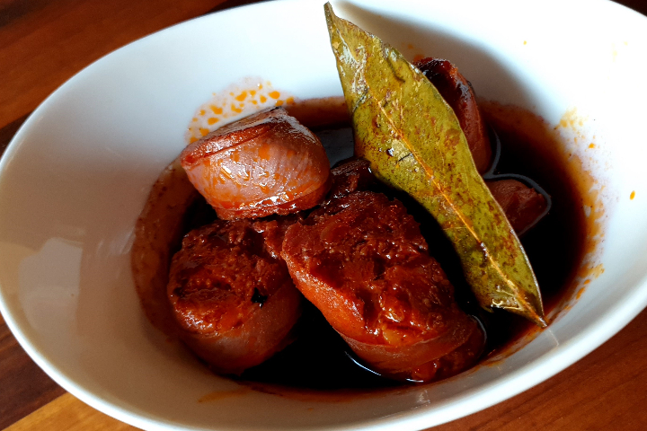 Chorizo de bellota al vino tinto - Volver - Café Tapas Vinos Luzern