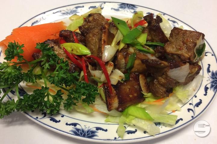 70. Lacquered pork ribs spicy with garlic and white wine - Mandarine