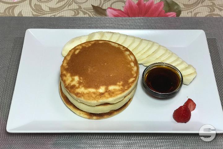 Lovely pan cakes and maple syrup - Magpies Café