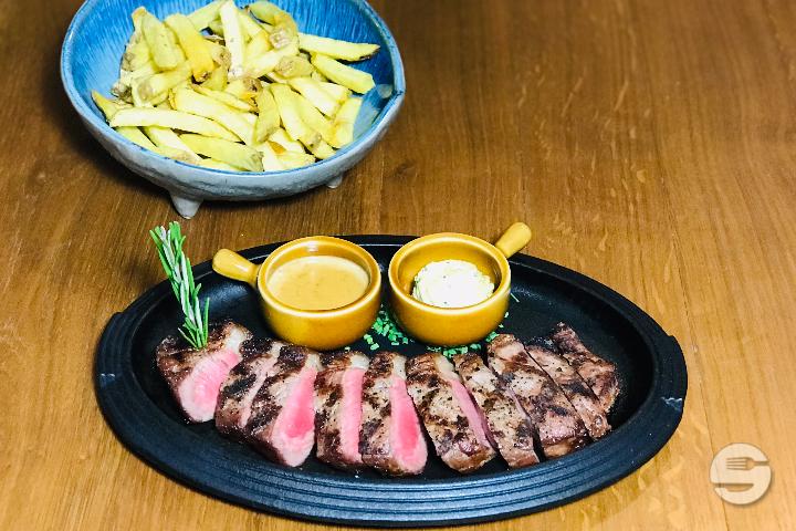 Grilled Beef Rib steak over a wood fire (220g) - Face au Lac