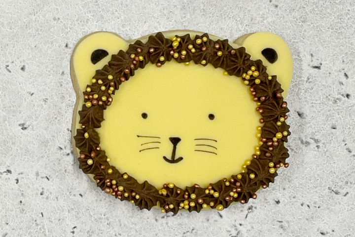 Biscuit Lion - Royaume MELAZIC Lausanne