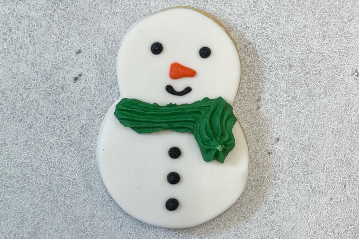 Biscuit Bonhomme de neige avec écharpe - Royaume MELAZIC Lausanne