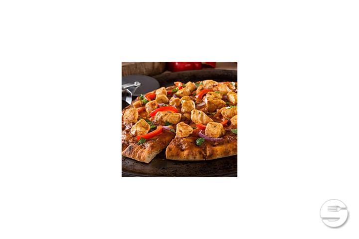 Butter chicken pizza - Tamarind Hill Zurich