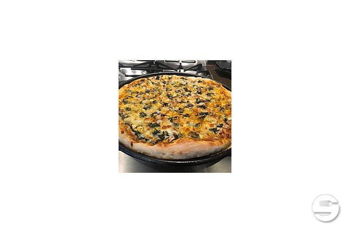 Saag chicken pizza - Tamarind Hill Zurich