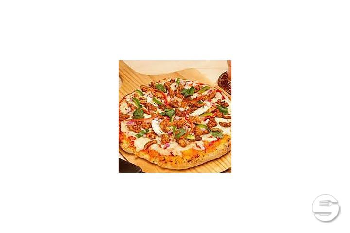 Spicy chicken pizza - Tamarind Hill Zurich