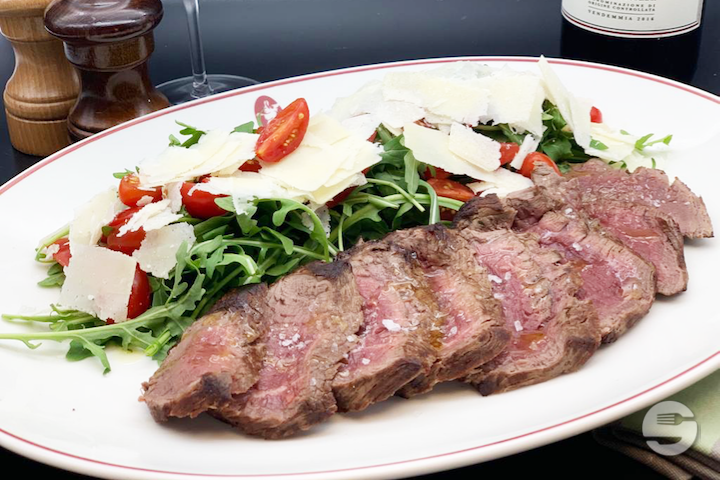 Tagliata Di Filetto Di Manzo con rucola grana e pomodorini - Luigia