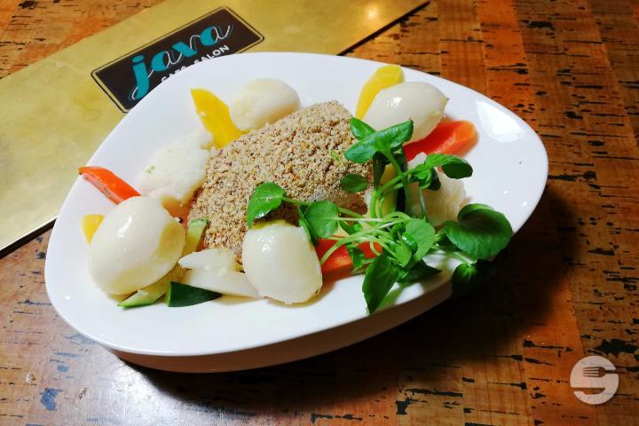 Royal cod poached in coconut milk and cress in a crust of roasted hazelnuts and orange zest - Java Café - Salon