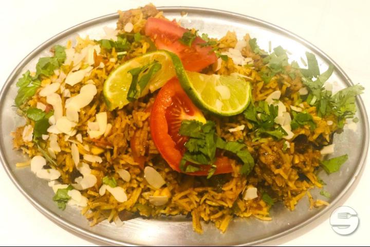 Biryani with side dish of your choice - Taj Mahal