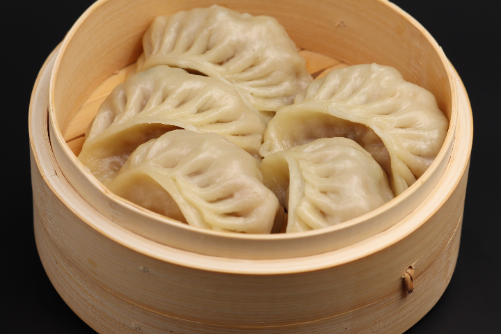 122. Pork dumplings - Les 4 Saisons