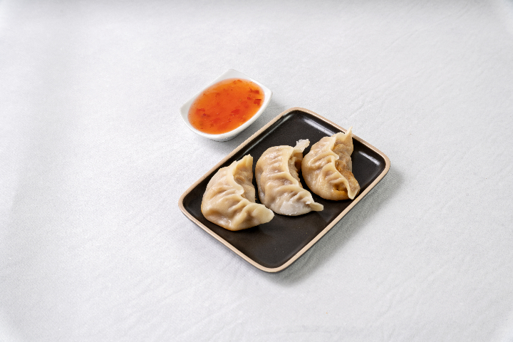 27. Jiao-zi Steamed Pork Ravioli - Qing Dao Express