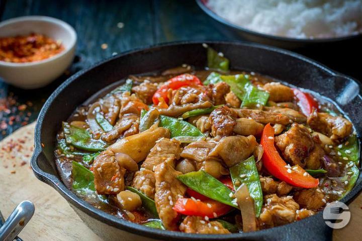 240. Beef in Black Pepper Sauce Served on a Slate - Le Lotus
