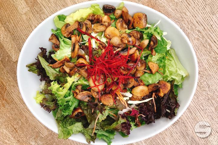 Salad with fried mushrooms and onions - Brauhaus