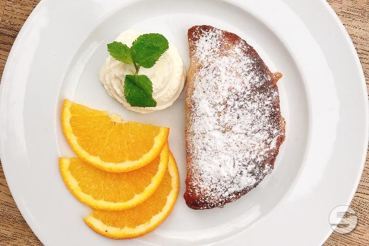 Freshly baked quark and apple doughnut - Brauhaus