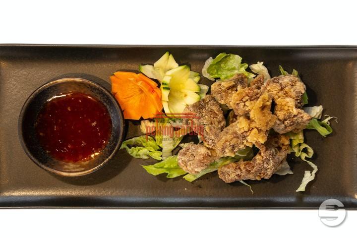 Marinierte Schweinsrippchen (4 Stück) - Peking Garden