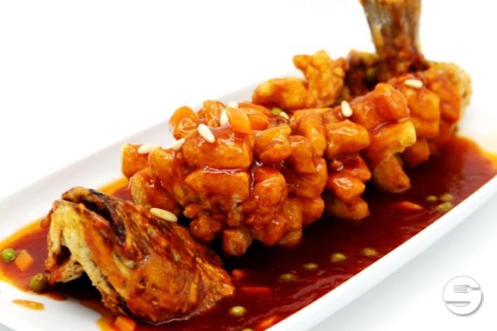 Sea bass in the shape of a pine cone in sweet sour - New Shanghai