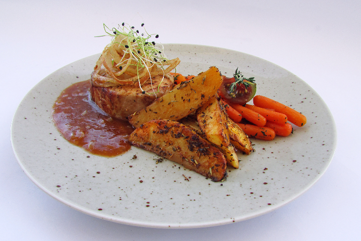 Schweinsteak mit Zwiebelsauce + Beilage - Lunch & Dinner KLG