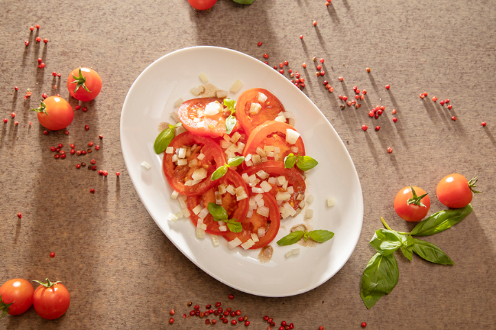 Tomatensalat mit Zwiebeln - Pizza World