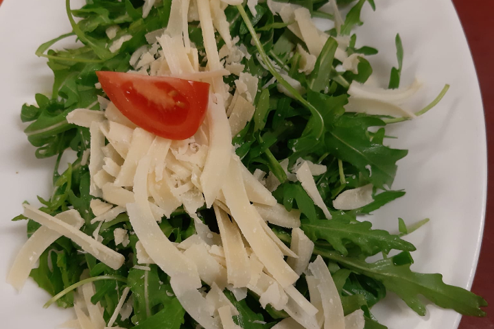 Rucola con parmigiano - Ristorante Pizzeria Pulcinella