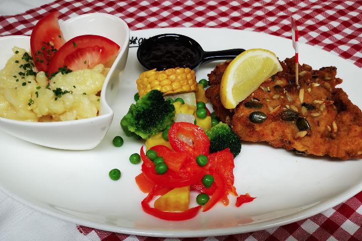 Veal cordon bleu in healthy grain breading - Landhaus Steirereck