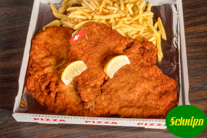 Paniertes Schweins Schnitzel - Restaurant Tramway