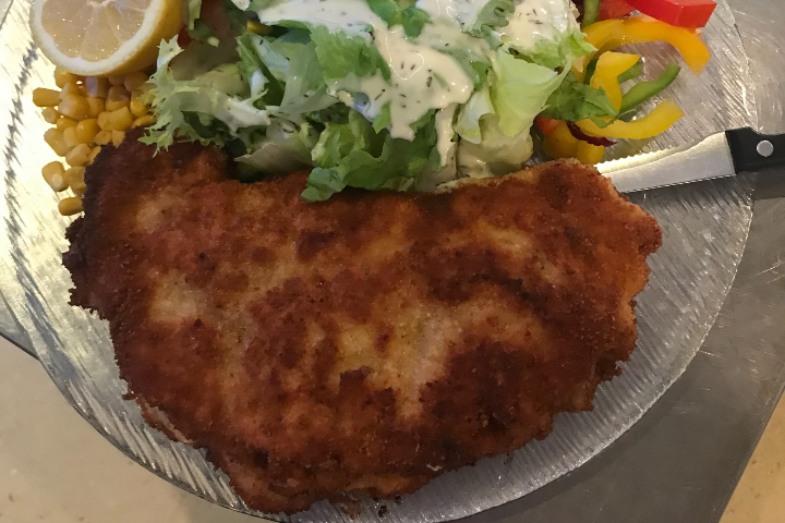Breaded pork schnitzel - Restaurant Rustica