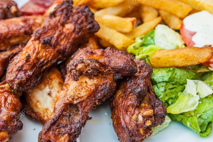 Chicken wings with fries - Namaste Indian Food