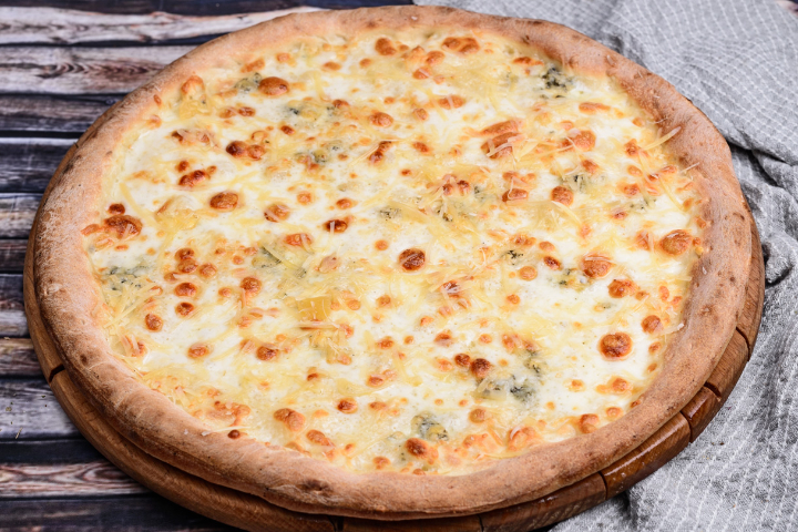 PIZZA QUATTRO FORMAGGI - BARACOA Bar - Restaurant - Lounge