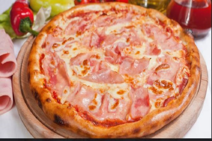 Pizza Prosciutto - Artigiano Cafe Bern