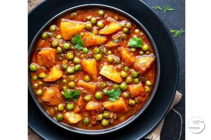 402. Aloo Matter - Singh Restaurant
