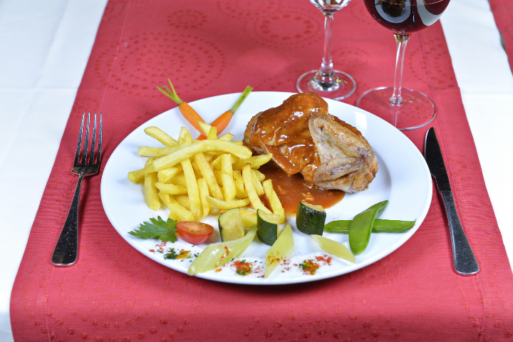Half Roast Chicken on a Broach - Cave Valaisanne