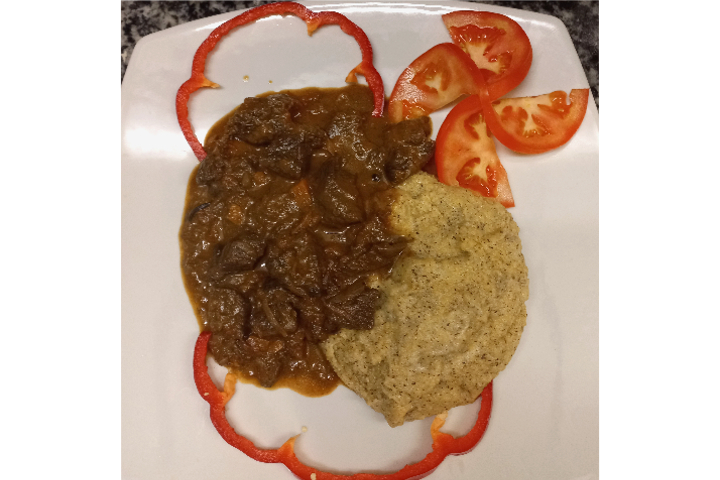 Polenta taragna con spezzatino di cervo di cacciagione - Pizzeria Café Lugano