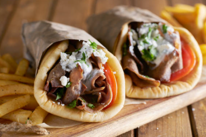 Pita with tzatziki and olives - Spyros Gyros